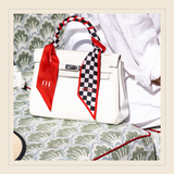 "Le Drapeau à Damiers" Malicieux